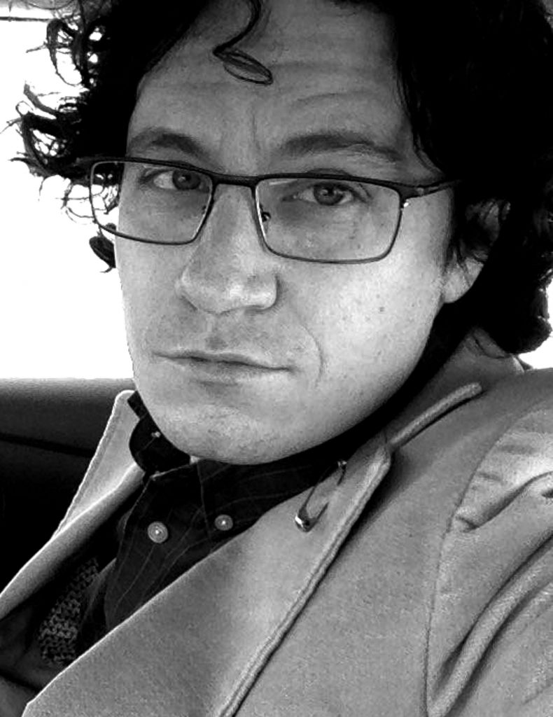 B&W photograph of author Michael J. DeLuca